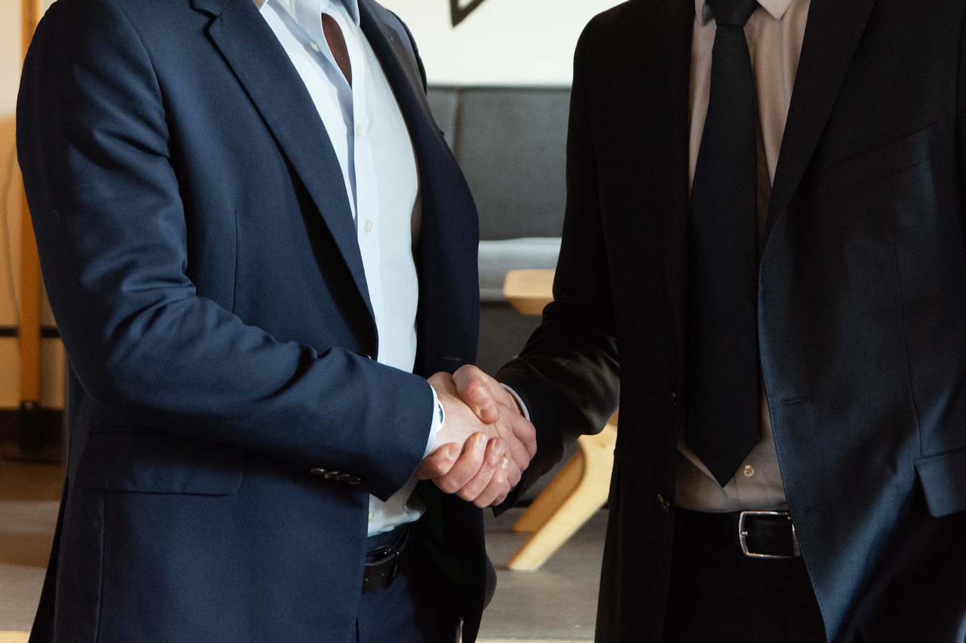 Business partners shaking hands